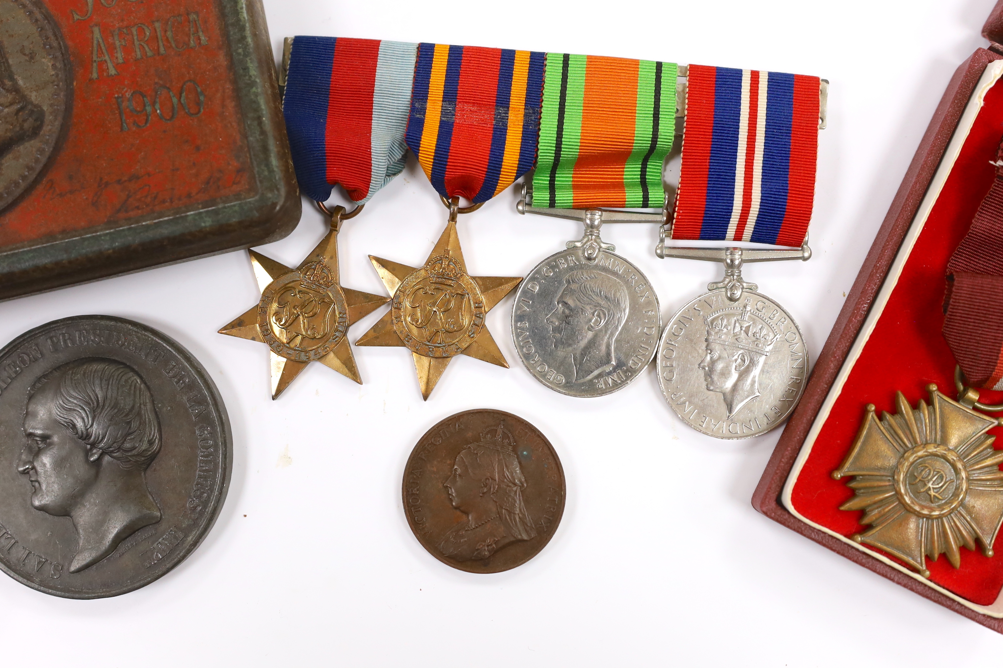 A WWII medal group comprising The Burma Star, The 1939-1945 Star, The Defence medal and The War medal, a cased 1870 Republique Francaise medal, a Victoria Golden Jubilee medallion, an 1855 Napoleon medallion, a Polish Cr